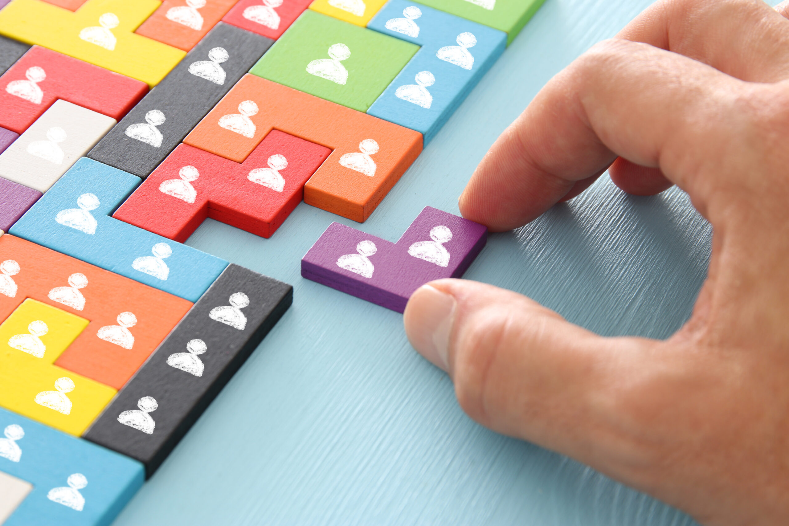 Image,Of,Tangram,Puzzle,Blocks,With,People,Icons,Over,Wooden Image,Of,Tangram,Puzzle,Blocks,With,People,Icons,Over,Wooden
